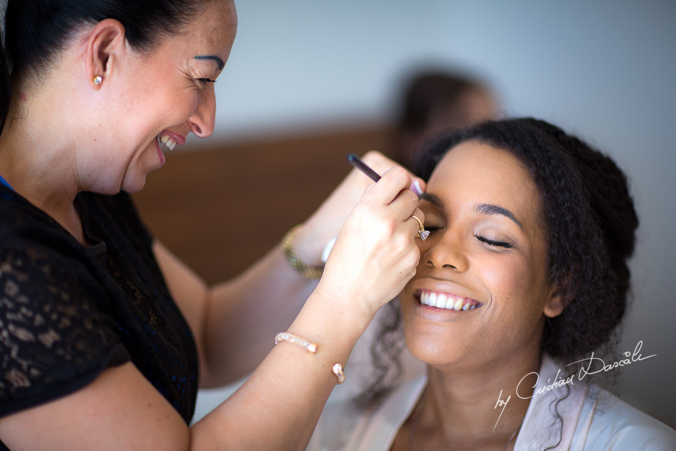 Unique moments captured during the make up for a wedding at Minthis Hills in Cyprus, by Cristian Dascalu.