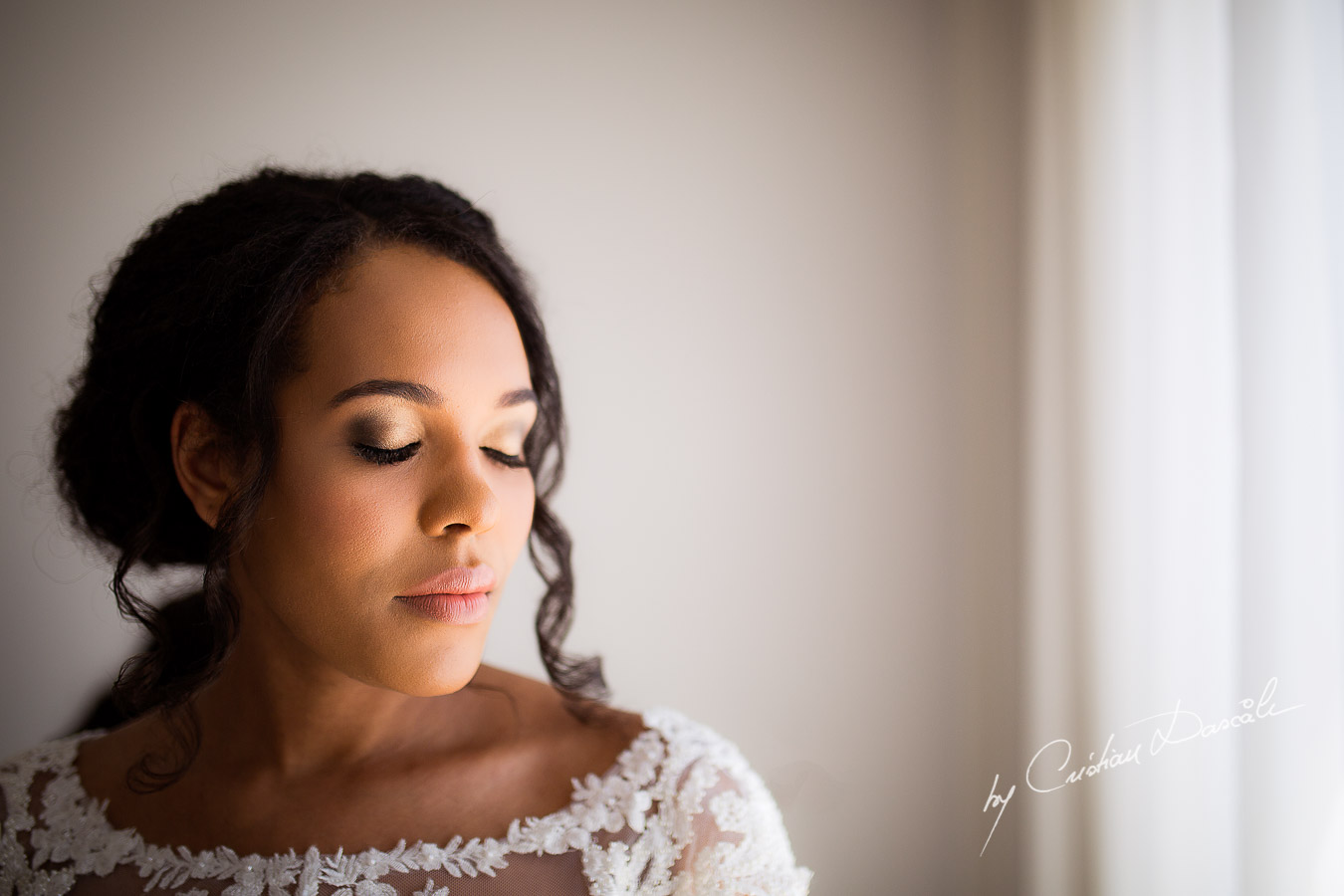 Beautiful bridal portrait captured at a wedding at Minthis Hills in Cyprus, by Cristian Dascalu.