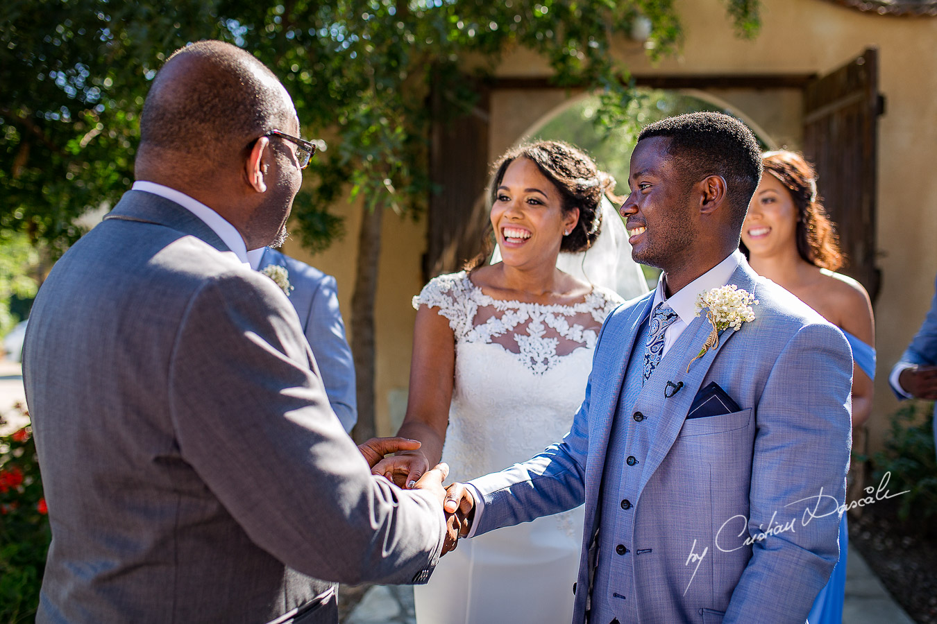 Beautiful ceremony moments captured at a wedding at Minthis Hills in Cyprus, by Cristian Dascalu.