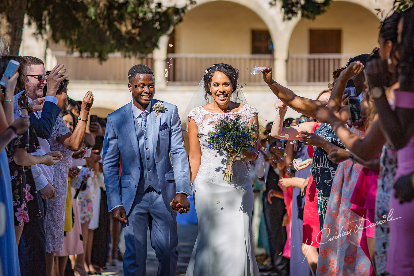 Beautiful confetti photos Beautiful ceremony moments captured at a wedding at Minthis Hills in Cyprus, by Cristian Dascalu.