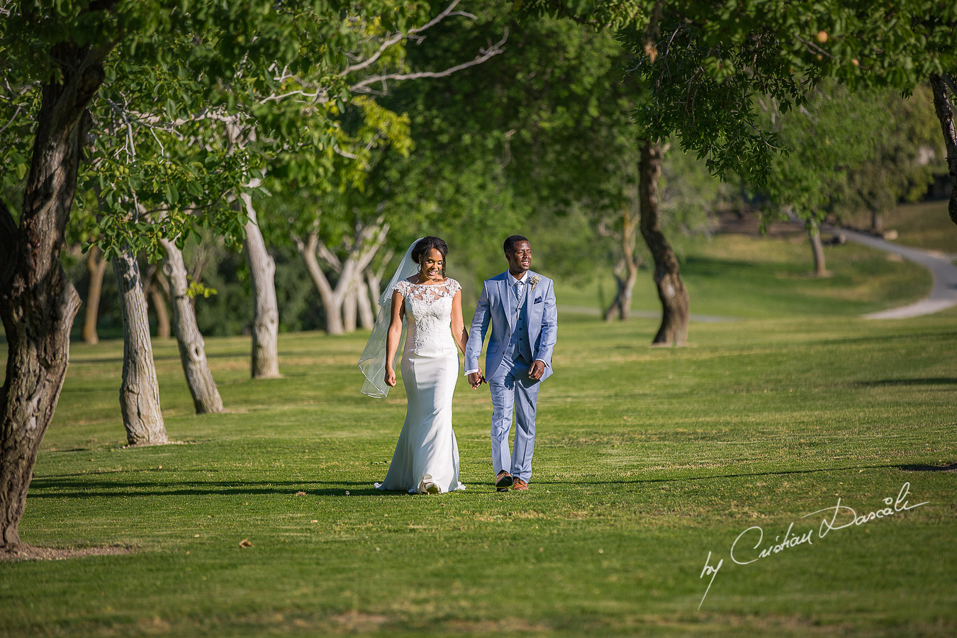 Bride and groom mini-photo session captured at a wedding at Minthis Hills in Cyprus, by Cristian Dascalu.