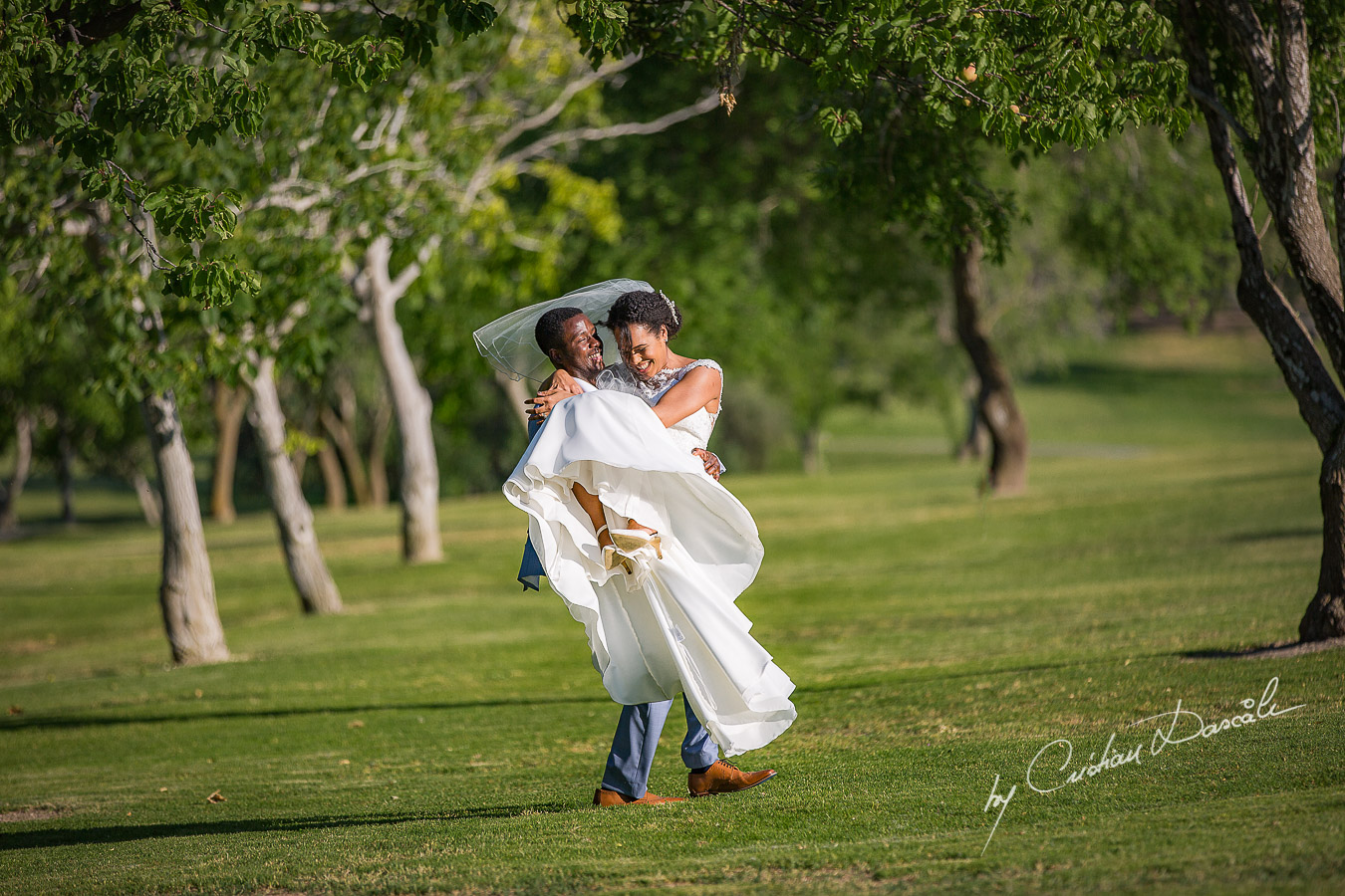 Bride and groom mini-photo session captured at a wedding at Minthis Hills in Cyprus, by Cristian Dascalu.