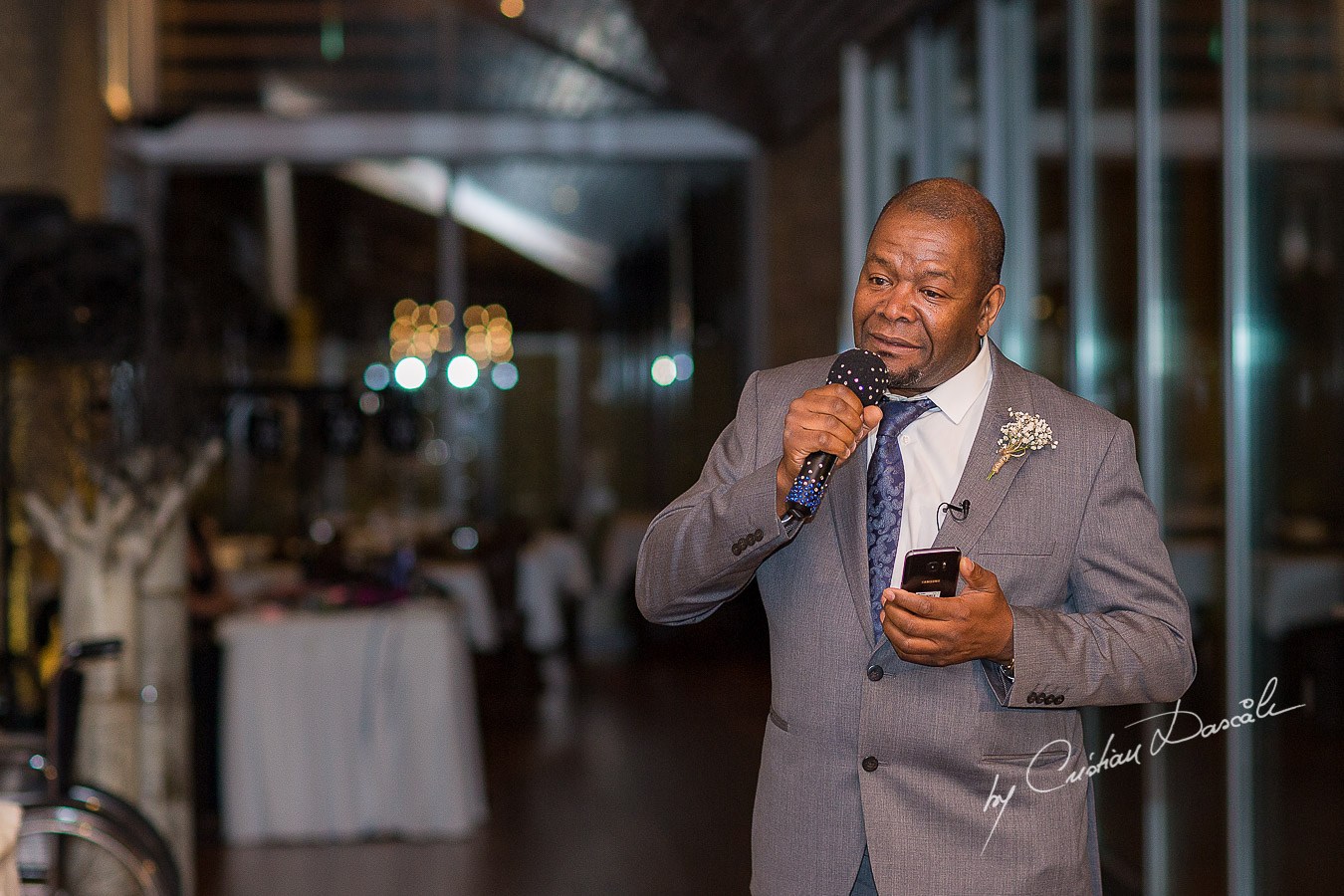 Father of the bride speech moment captured at a wedding at Minthis Hills in Cyprus, by Cristian Dascalu.