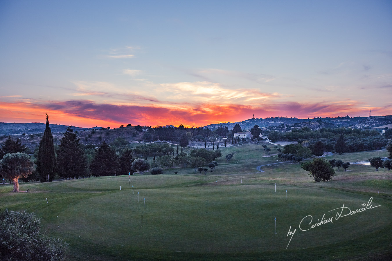 Beautiful sunset landscape captured at a wedding at Minthis Hills in Cyprus, by Cristian Dascalu.