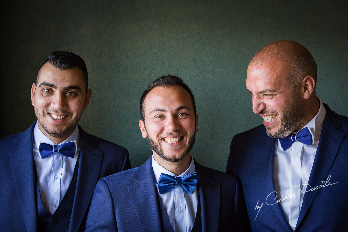 Groom and bestmen posing during getting ready as part of an Exclusive Wedding photography at the Grand Resort Limassol, captured by Cyprus Wedding Photographer Cristian Dascalu.