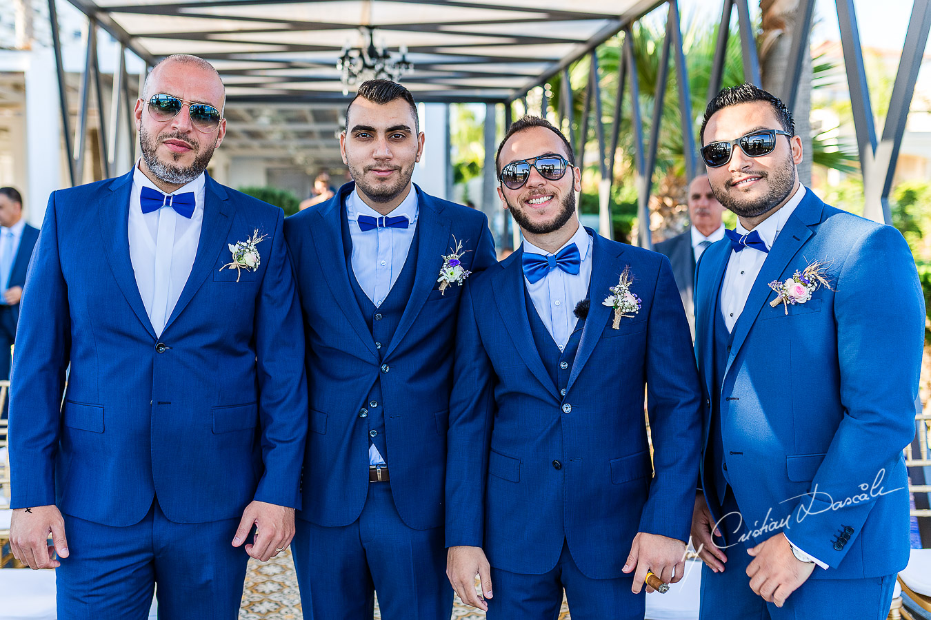 Groom and best men posing before the reception, as part of an Exclusive Wedding photography at Grand Resort Limassol, captured by Cyprus Wedding Photographer Cristian Dascalu.