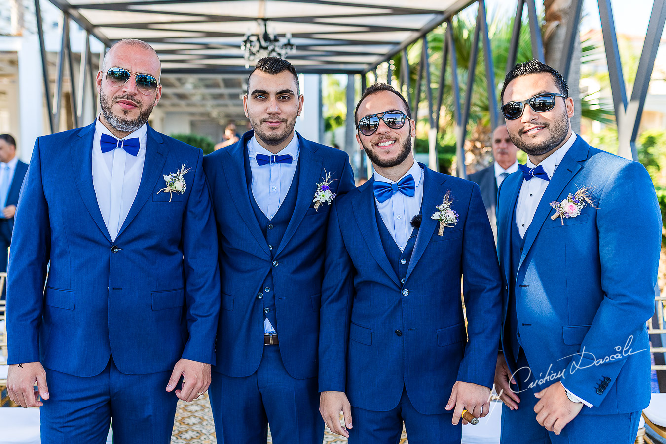 Groom and best men posing before the reception, as part of an Exclusive Wedding photography at Grand Resort Limassol, captured by Cyprus Wedding Photographer Cristian Dascalu.