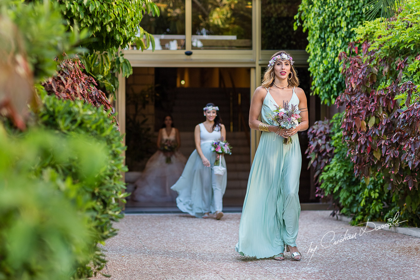 Bridesmaids photographed during the ceremony, as part of an Exclusive Wedding photography at Grand Resort Limassol, captured by Cyprus Wedding Photographer Cristian Dascalu.