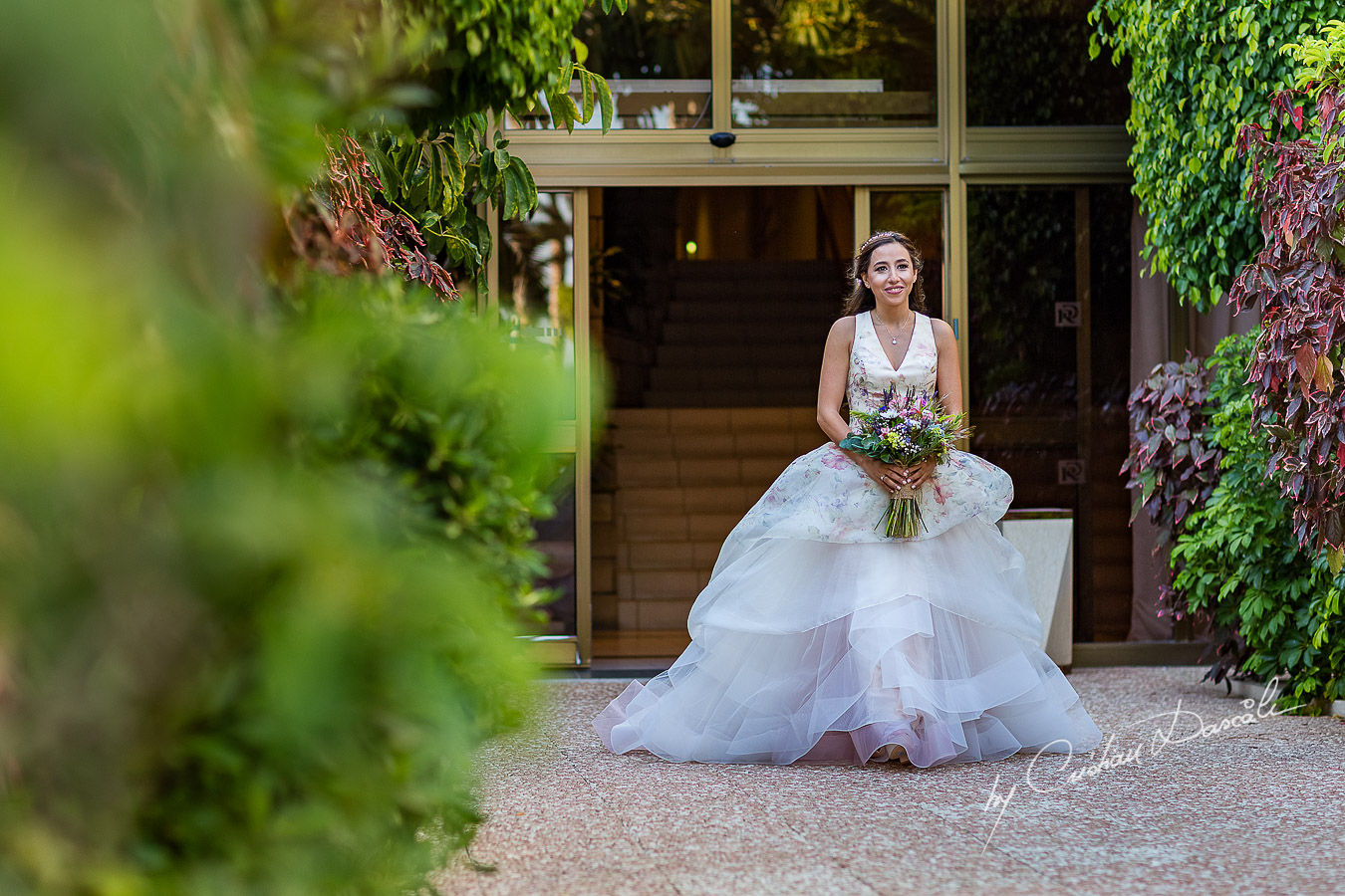 The bride coming down the isle photographed during the ceremony, as part of an Exclusive Wedding photography at Grand Resort Limassol, captured by Cyprus Wedding Photographer Cristian Dascalu.