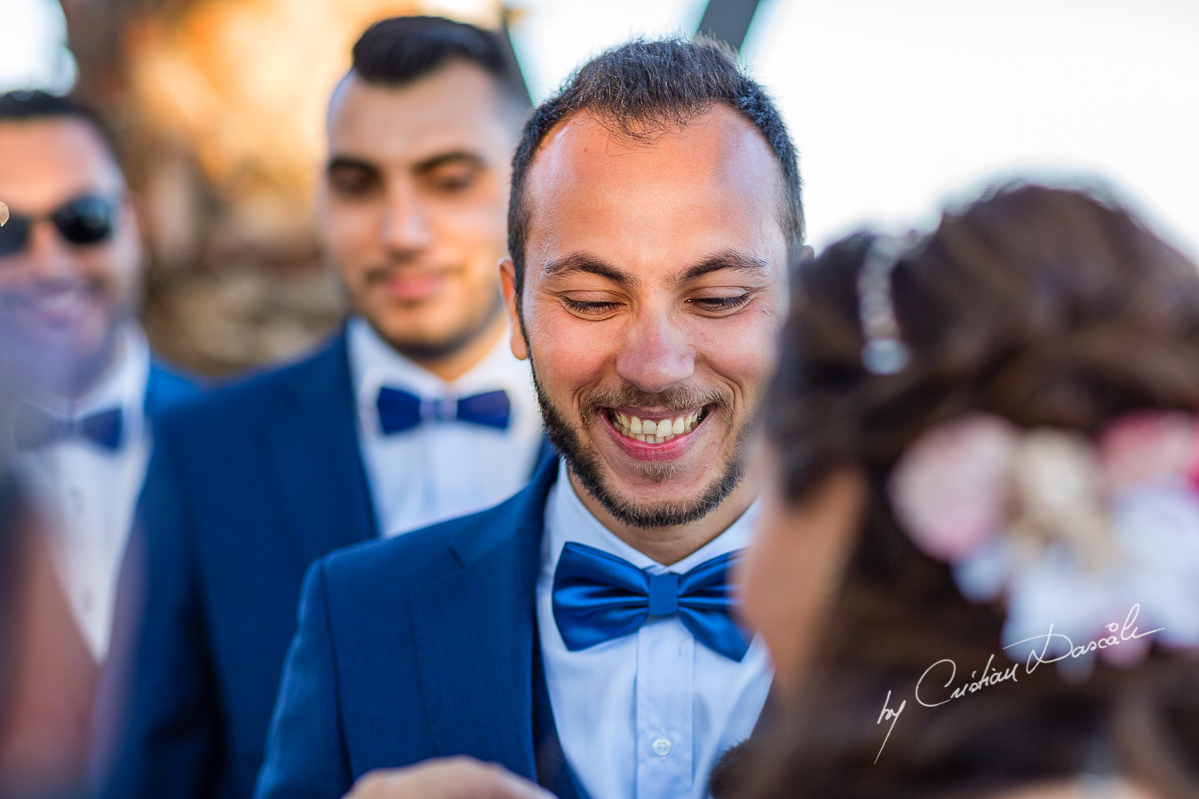 Genuine moments with the groom and the bride during the ceremony, as part of an Exclusive Wedding photography at Grand Resort Limassol, captured by Cyprus Wedding Photographer Cristian Dascalu.