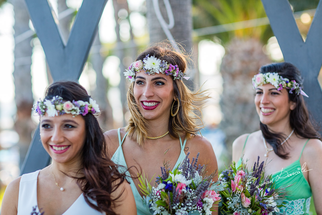 Genuine moments with the bridesmaids during the ceremony, as part of an Exclusive Wedding photography at Grand Resort Limassol, captured by Cyprus Wedding Photographer Cristian Dascalu.
