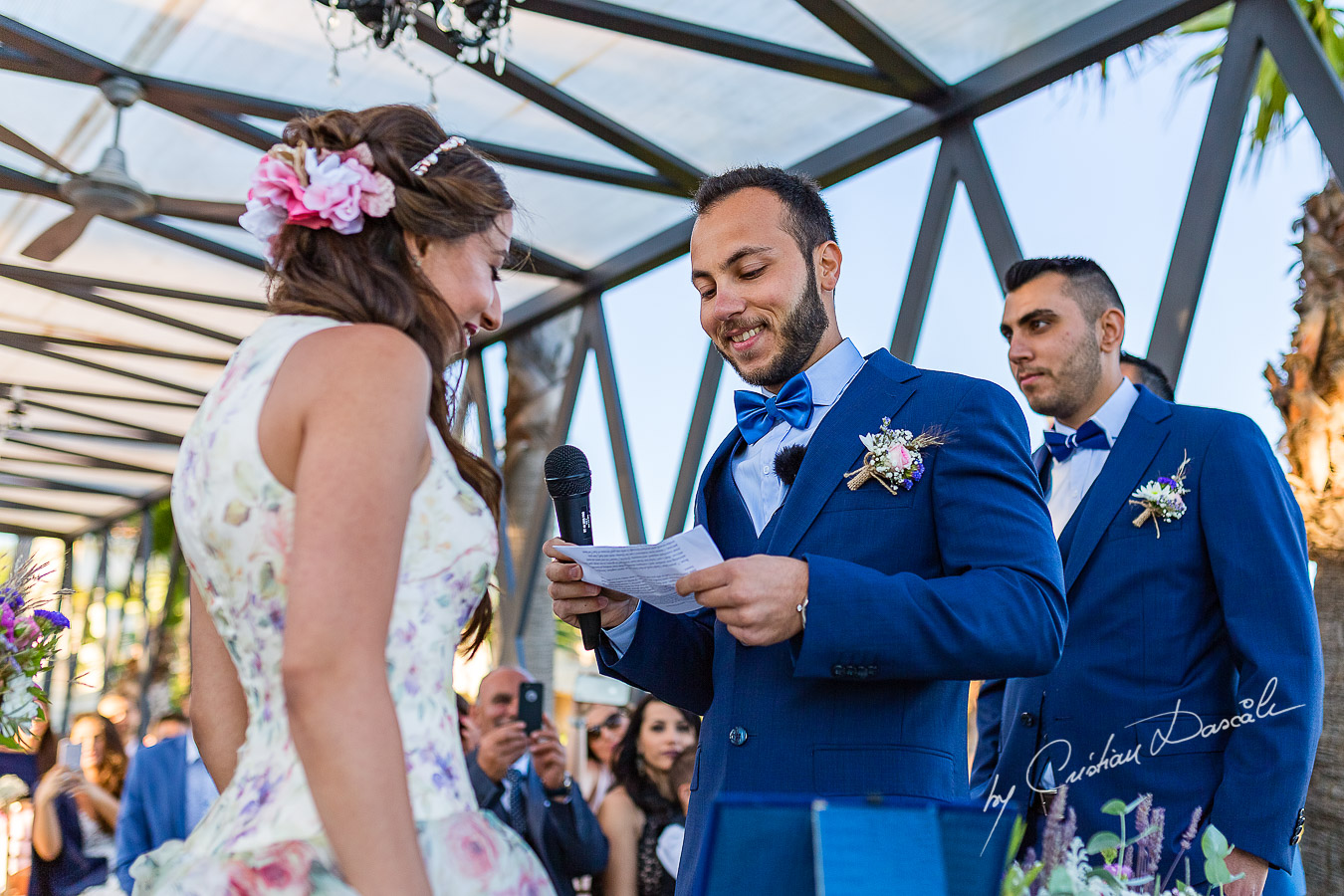 Genuine moments with the bride and groom during the ceremony, as part of an Exclusive Wedding photography at Grand Resort Limassol, captured by Cyprus Wedding Photographer Cristian Dascalu.