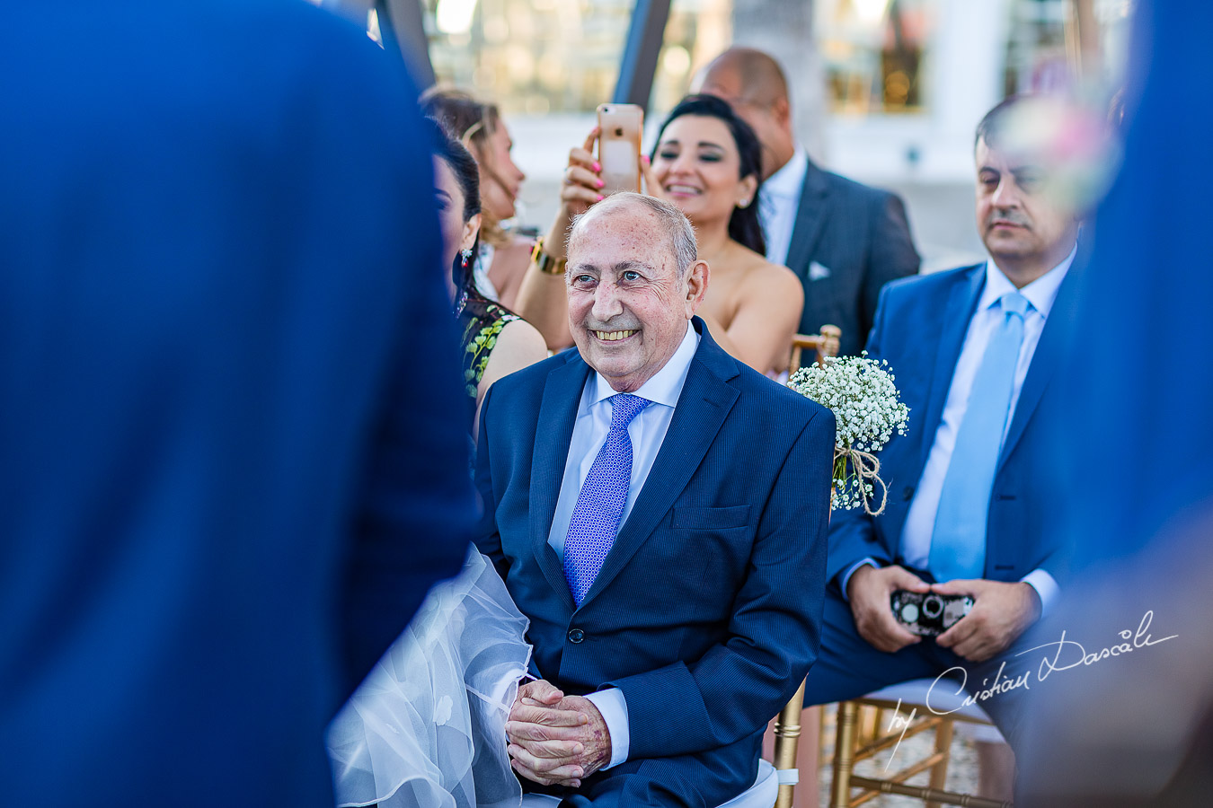 Beautiful moments with the father of the bride during the ceremony, as part of an Exclusive Wedding photography at Grand Resort Limassol, captured by Cyprus Wedding Photographer Cristian Dascalu.