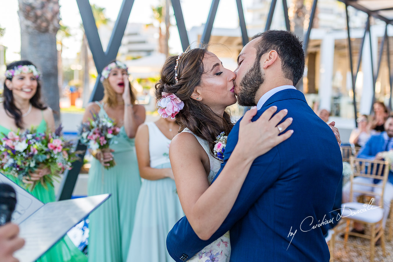 Genuine moments with the bride and groom during the ceremony, as part of an Exclusive Wedding photography at Grand Resort Limassol, captured by Cyprus Wedding Photographer Cristian Dascalu.