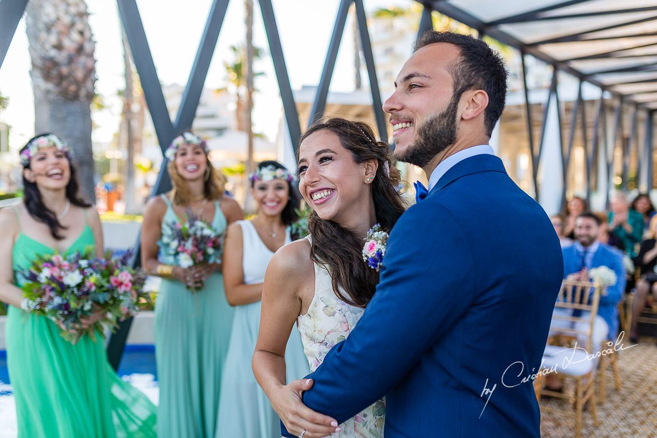 Genuine moments with the bride and groom during the ceremony, as part of an Exclusive Wedding photography at Grand Resort Limassol, captured by Cyprus Wedding Photographer Cristian Dascalu.