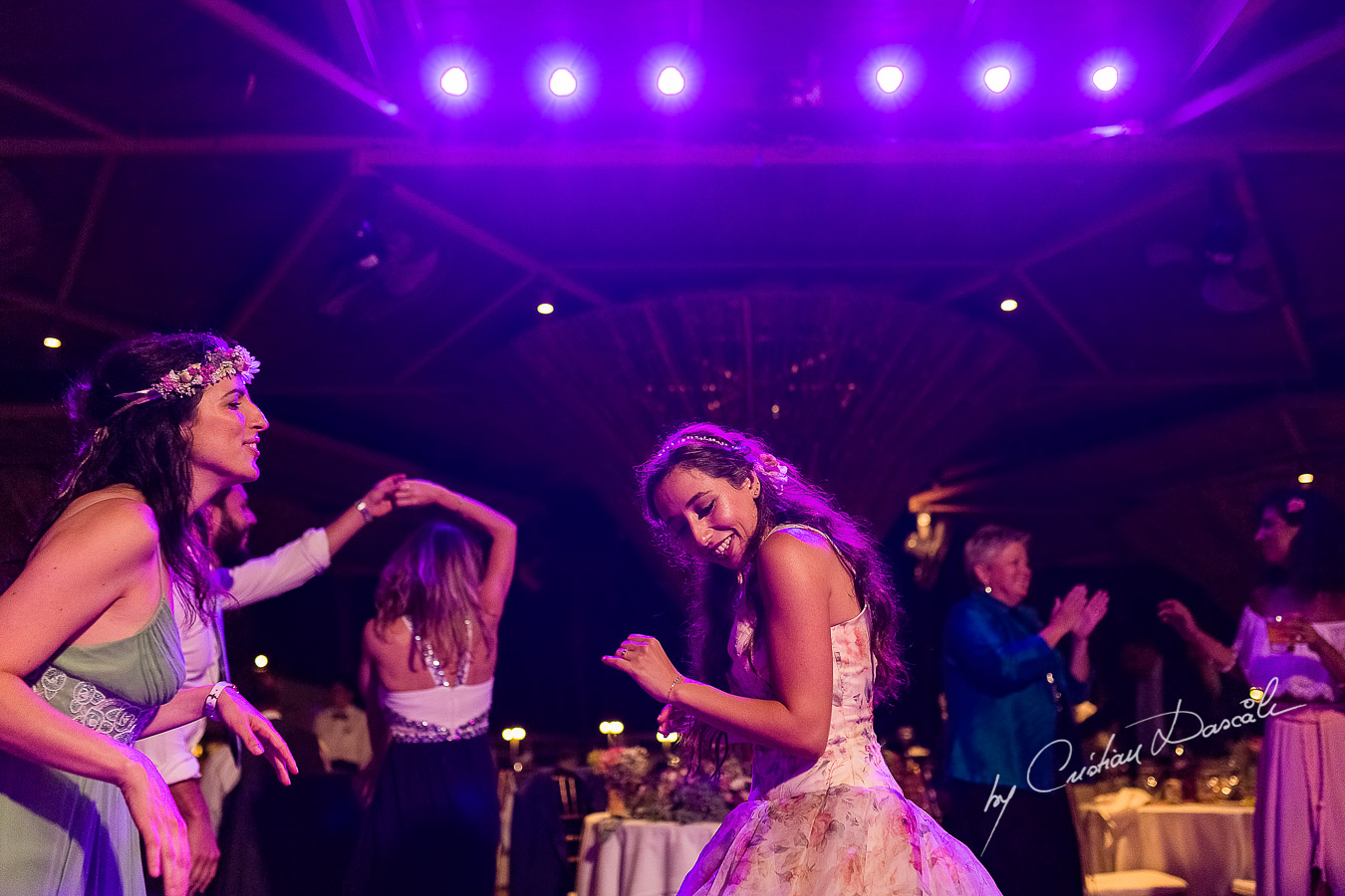 Bride dancing at her wedding, a unique moment photographed as part of an Exclusive Wedding photography at Grand Resort Limassol, captured by Cyprus Wedding Photographer Cristian Dascalu.