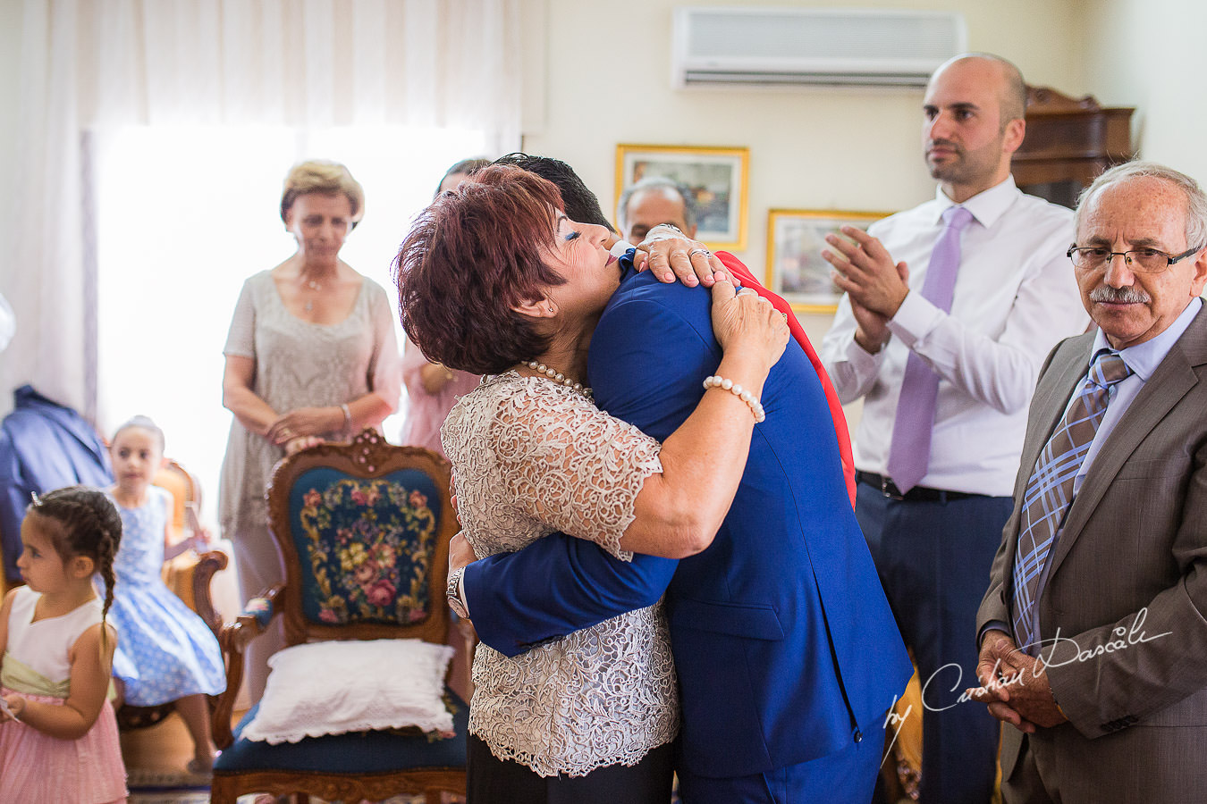 Mom and son moments, captured at a wedding in Cyprus by Photographer Cristian Dascalu.