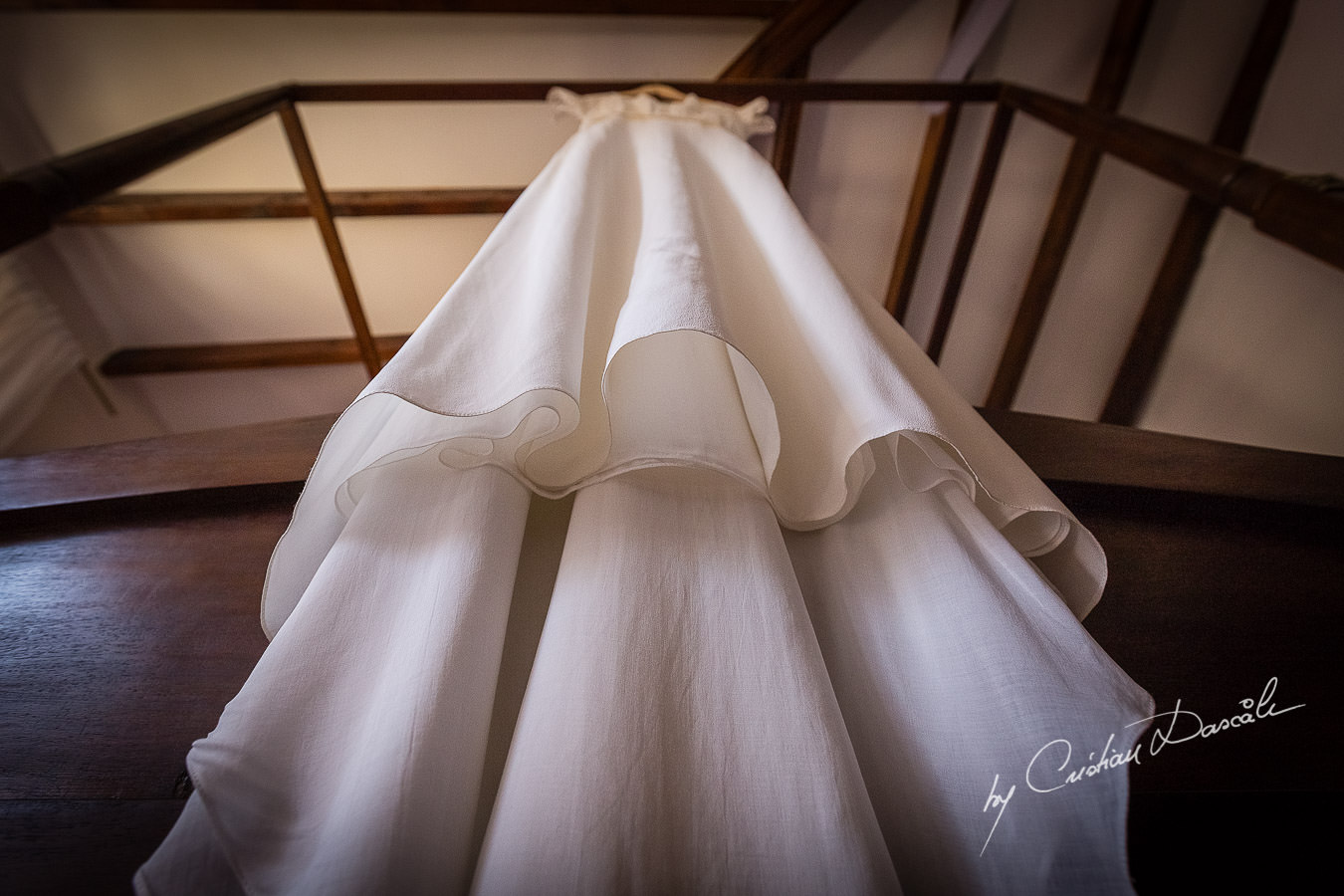 A beautiful wedding day at the Vasilias Nikoklis Inn in Paphos, captured by Cristian Dascalu. The Bride's Dress.