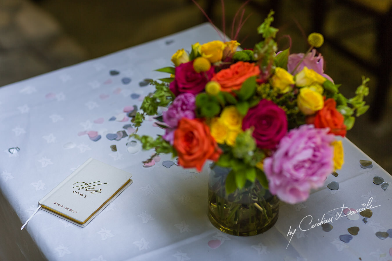 A beautiful wedding day at the Vasilias Nikoklis Inn in Paphos, captured by Cristian Dascalu. The ceremony table.