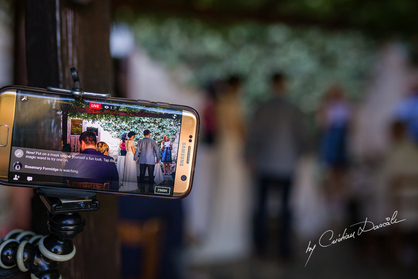 A beautiful wedding day at the Vasilias Nikoklis Inn in Paphos, captured by Cristian Dascalu. The grandmother of the groom is watching the ceremony live on Facebook.