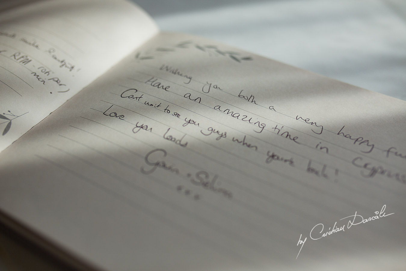 The guest book photographed by Cristian Dascalu at Athena Beach Hotel in Paphos, Cyprus, during a symbolic wedding.