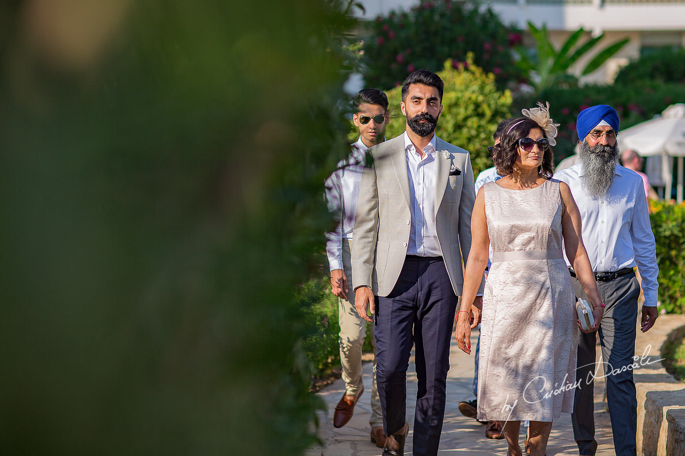The groom arriving for the wedding ceremony, moments photographed by Cristian Dascalu at Athena Beach Hotel in Paphos, Cyprus, during a symbolic wedding.