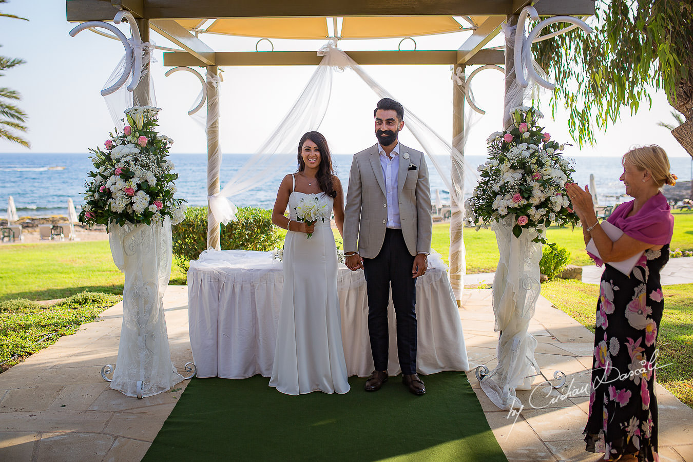 Moments photographed by Cristian Dascalu at Athena Beach Hotel in Paphos, Cyprus, during a symbolic wedding.