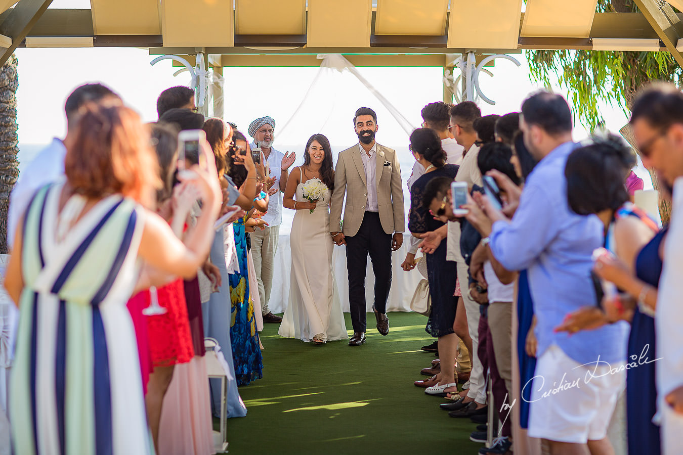 Moments photographed by Cristian Dascalu at Athena Beach Hotel in Paphos, Cyprus, during a symbolic wedding.