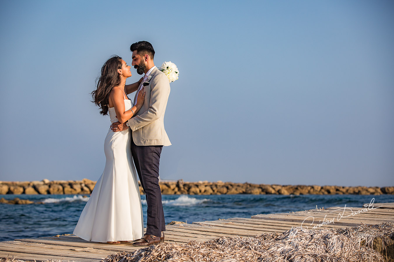 Harpreet and Sabrina photographed by Cristian Dascalu at Athena Beach Hotel in Paphos, Cyprus, during a symbolic wedding.