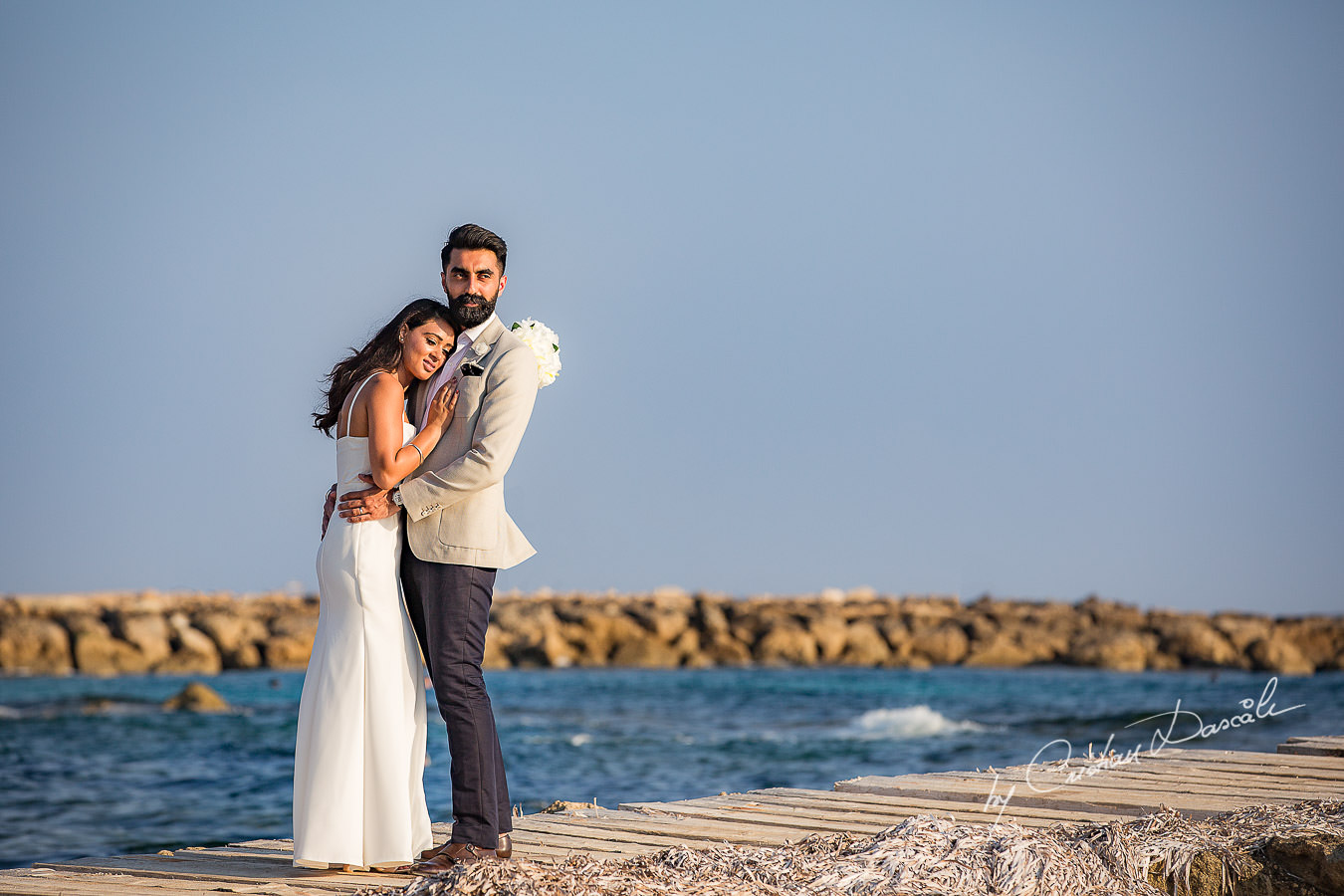 Harpreet and Sabrina photographed by Cristian Dascalu at Athena Beach Hotel in Paphos, Cyprus, during a symbolic wedding.