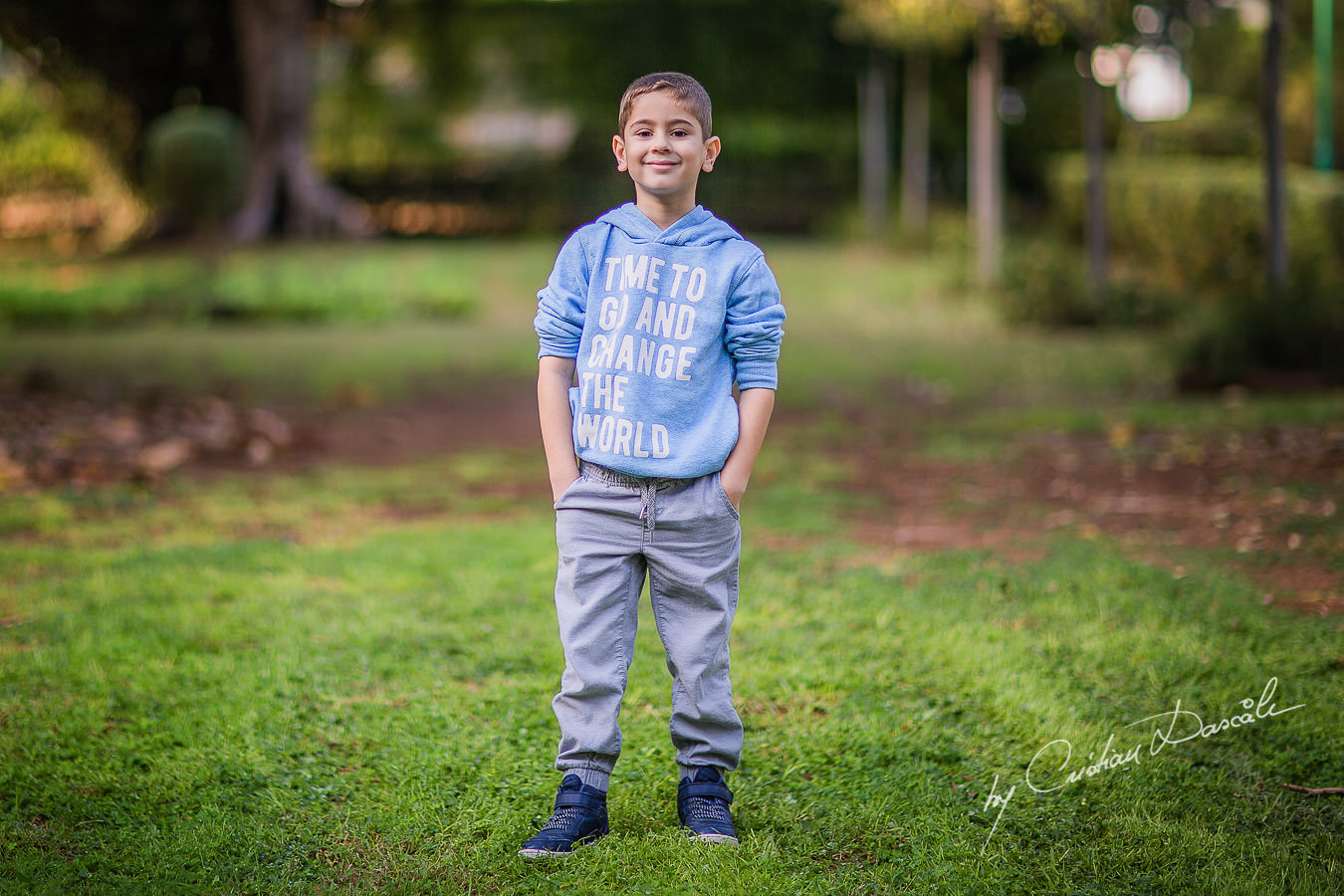 Young man in the park, moments captured by Cristian Dascalu during a beautiful Limassol family photography photo session.
