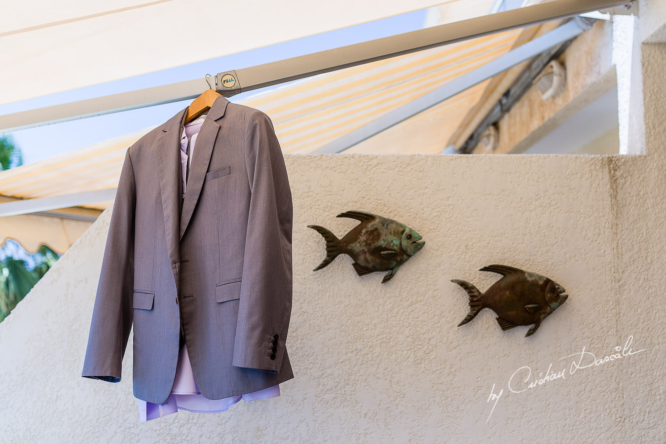 Groom's suit hanged at the groom's house during a wedding at St Raphael Limassol.