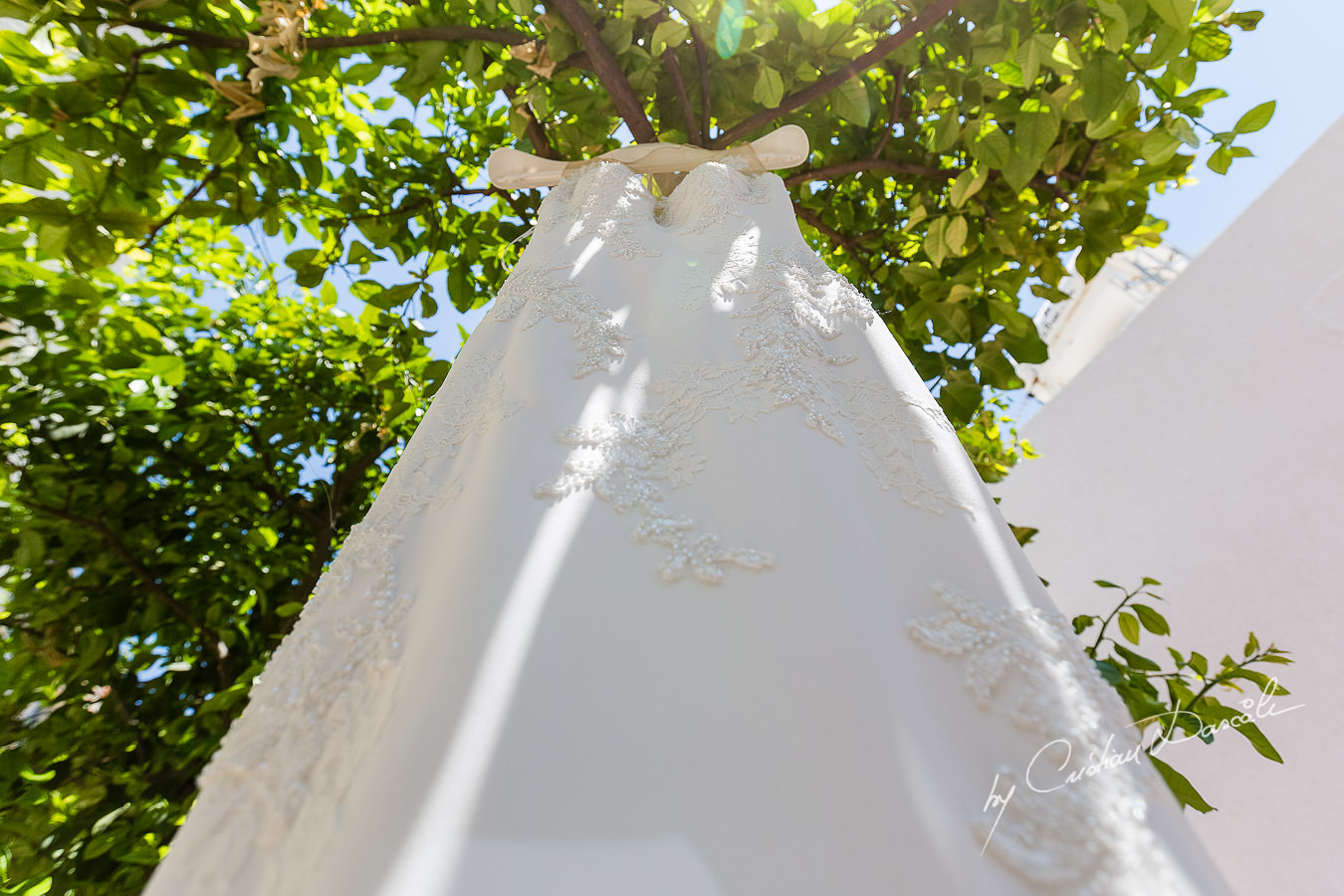 Beautiful Wedding Dress photographed by Cristian Dascalu during a wedding ceremony at St Raphael Hotel in Limassol, Cyprus.