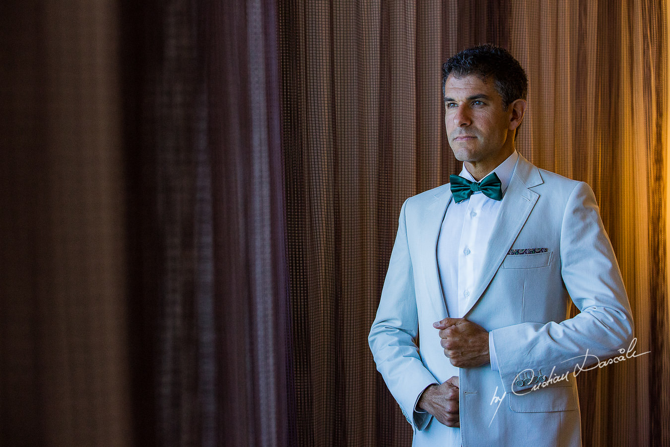 Portrait of the groom captured during a wedding photography at the Lighthouse Limassol, by Cyprus Photographer Cristian Dascalu.