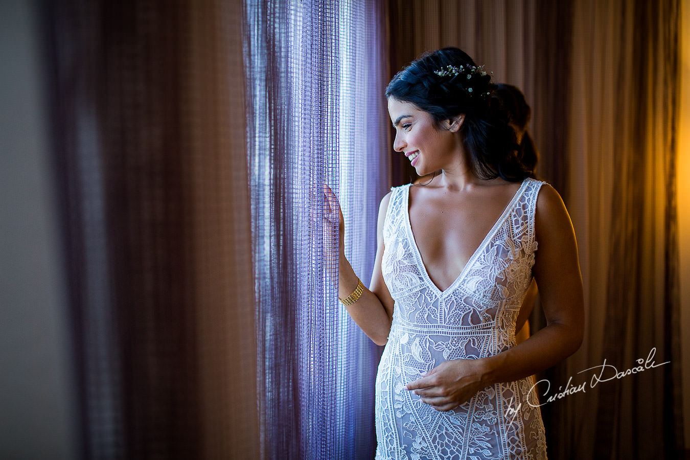 Smiling bridal portrait captured during a wedding photography at the Lighthouse Limassol, by Cyprus Photographer Cristian Dascalu.