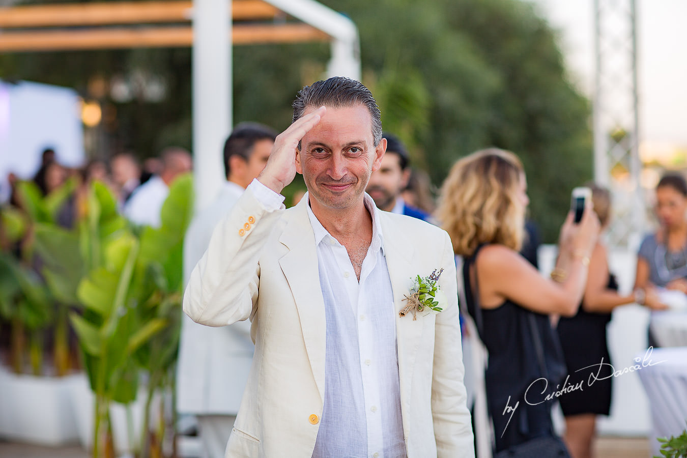 The best man saluting, moments captured during a wedding photography at the Lighthouse Limassol, by Cyprus Photographer Cristian Dascalu.