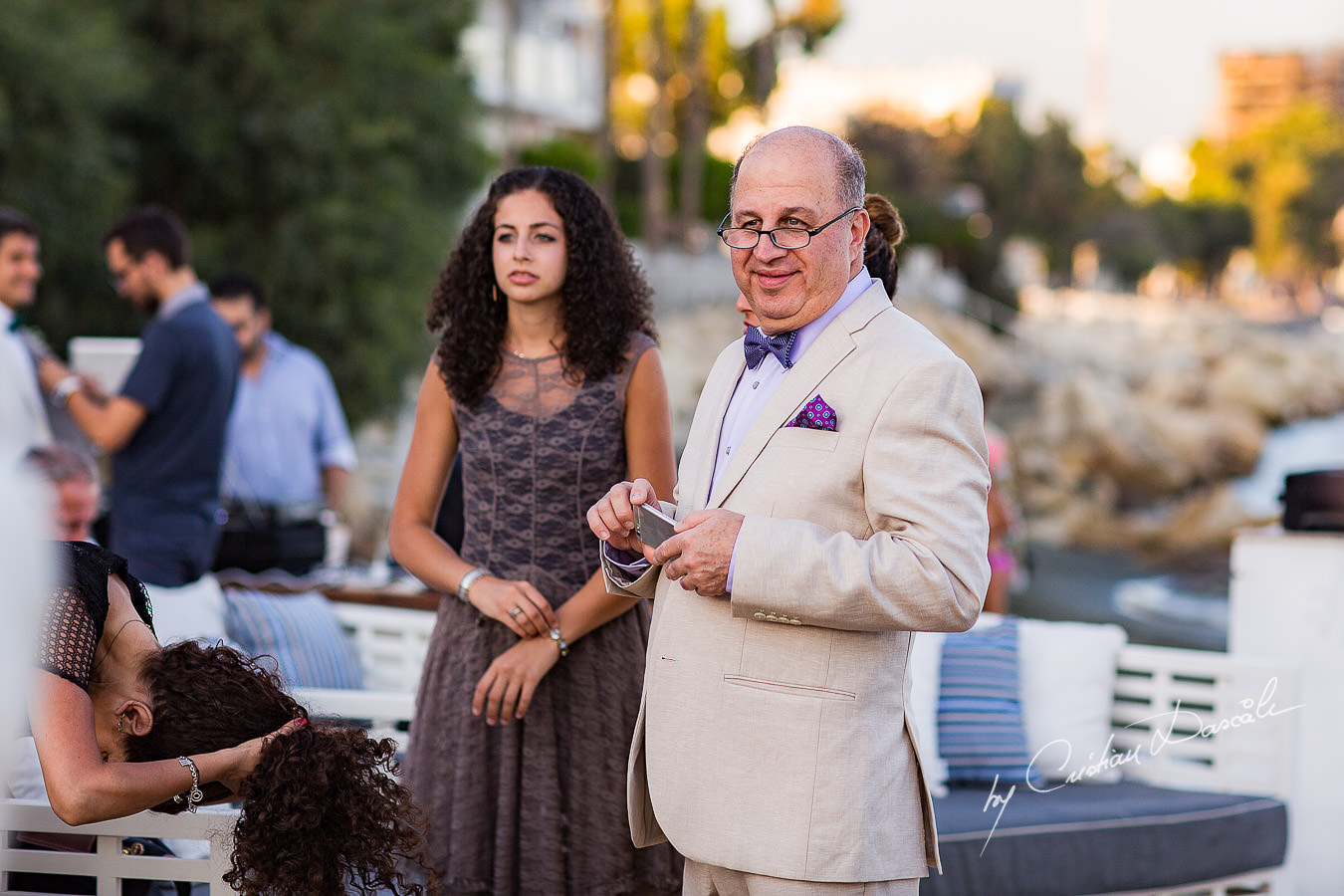 Guests moments captured during a wedding photography at the Lighthouse Limassol, by Cyprus Photographer Cristian Dascalu.