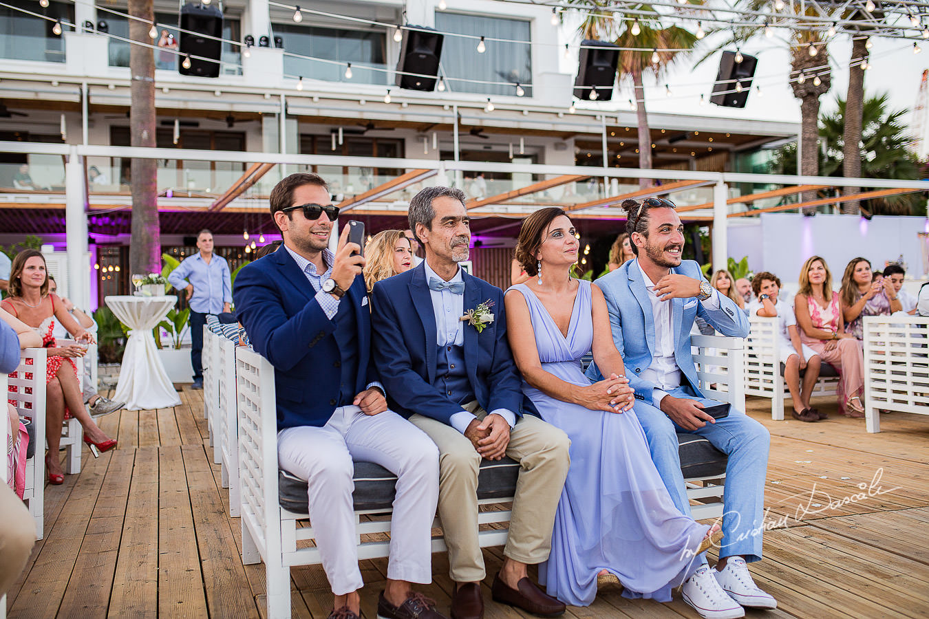 Wedding guests moments captured during a wedding photography at the Lighthouse Limassol, by Cyprus Photographer Cristian Dascalu.