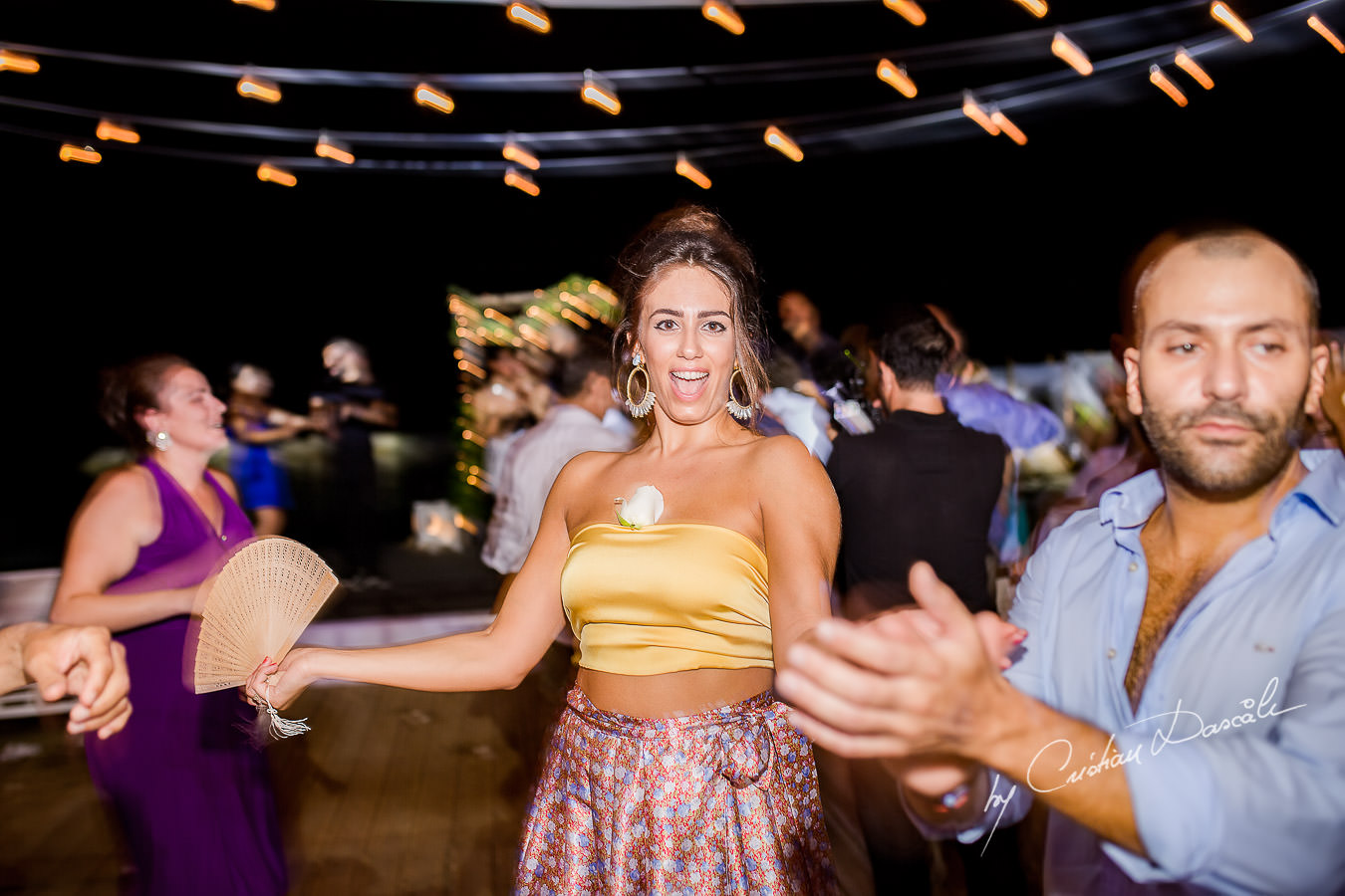 Guests dancing moments captured during a wedding photography at the Lighthouse Limassol, by Cyprus Photographer Cristian Dascalu.