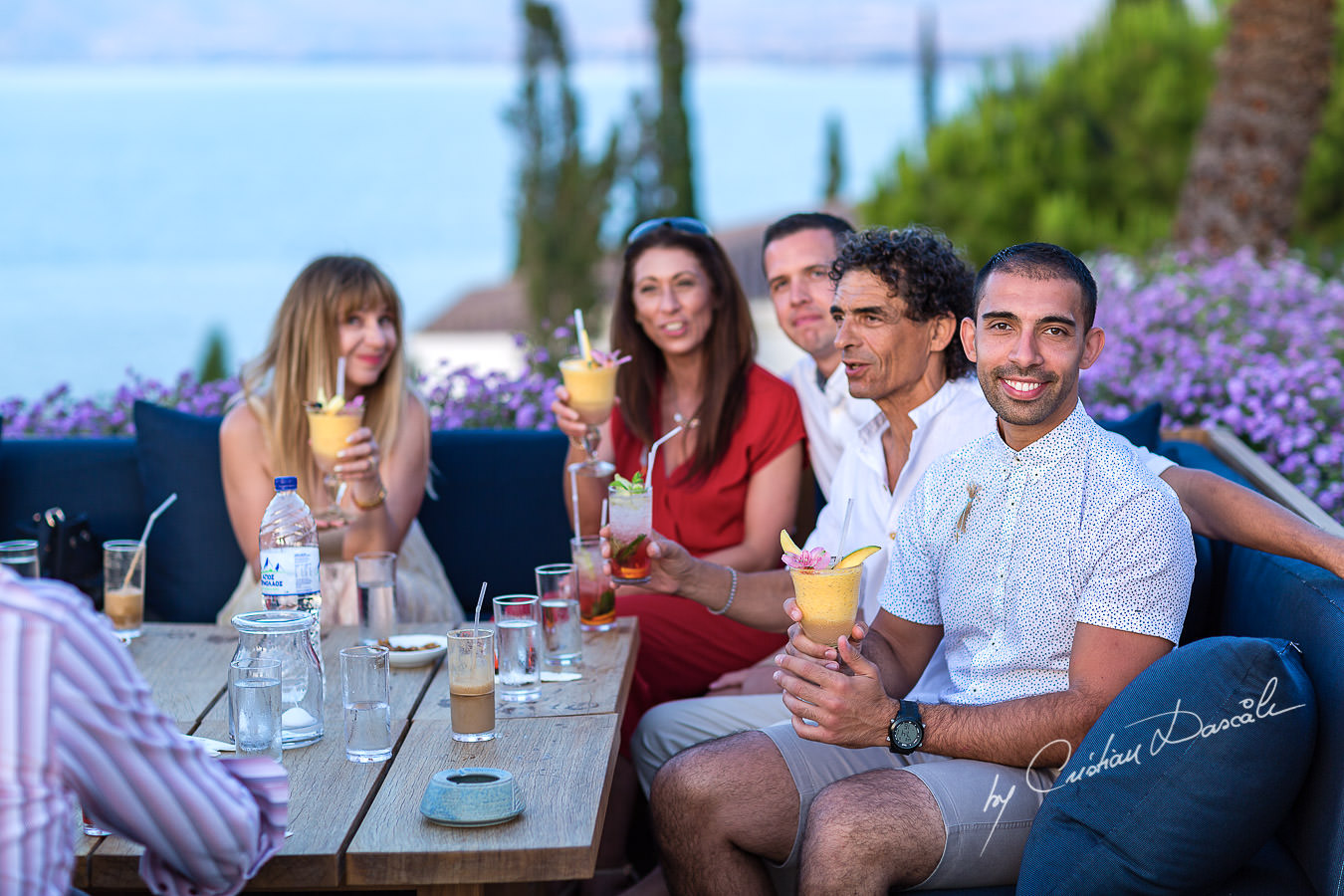 Guests chatting at the beautiful Anassa Hotel photographed by Cyprus Photographer Cristian Dascalu.