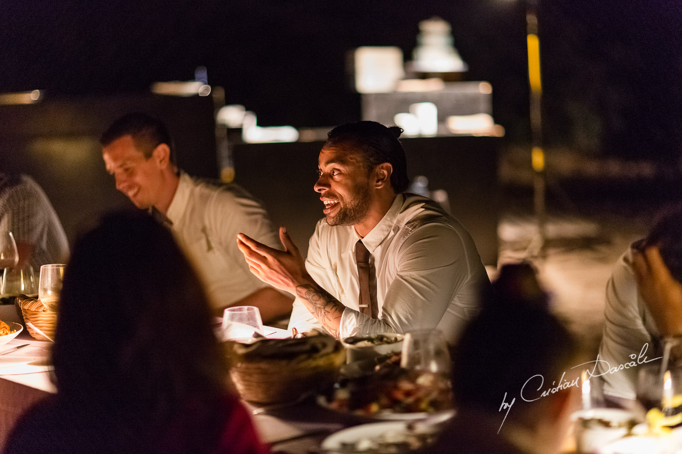 Guests chatting at the beautiful Anassa Hotel photographed by Cyprus Photographer Cristian Dascalu.