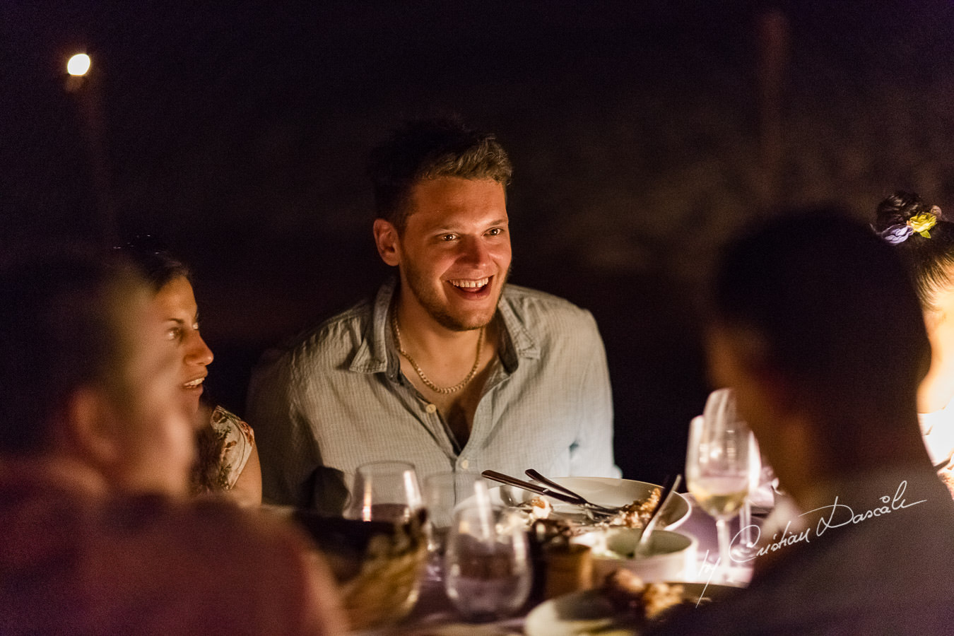 Guests chatting at the beautiful Anassa Hotel photographed by Cyprus Photographer Cristian Dascalu.