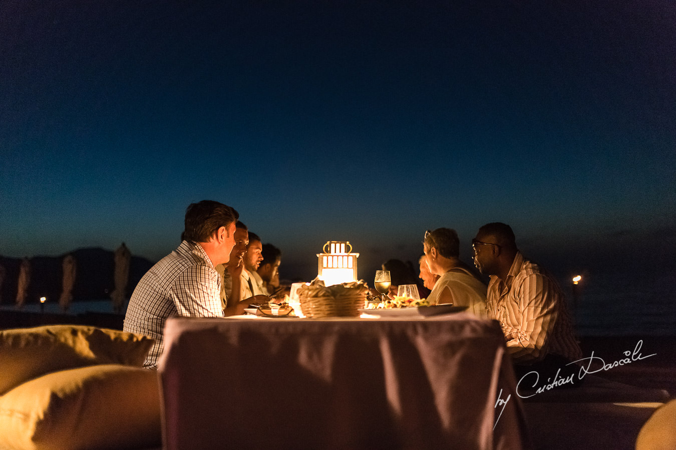 Guests chatting at the beautiful Anassa Hotel photographed by Cyprus Photographer Cristian Dascalu.