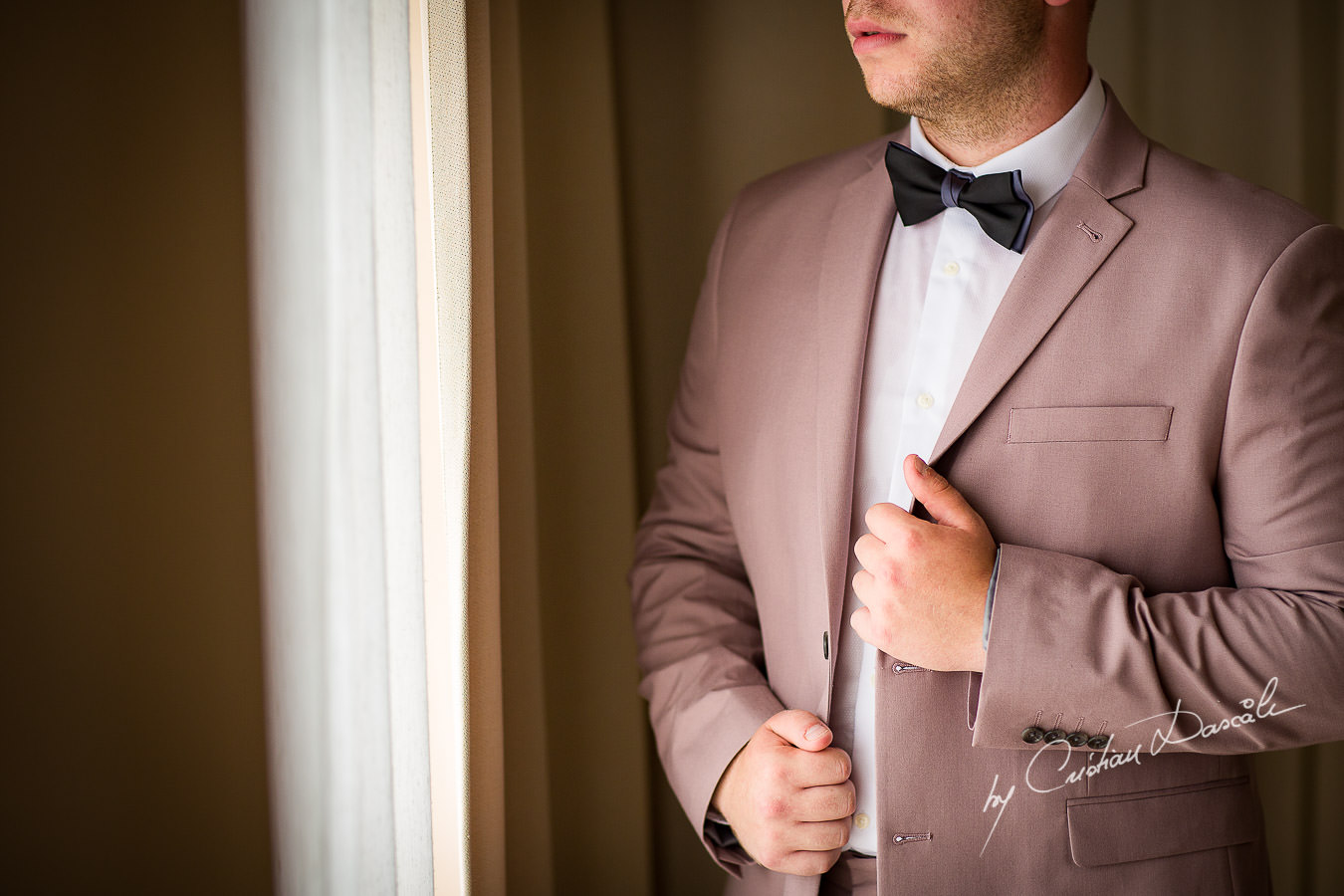 Groom portraiture at a Beautiful Wedding at Elias Beach Hotel captured by Cyprus Photographer Cristian Dascalu.