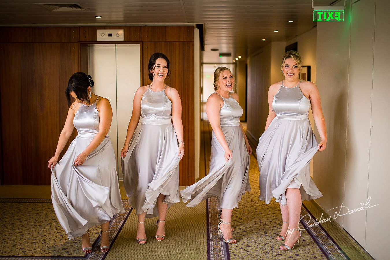 The Bridesmaids having fun during a Beautiful Wedding at Elias Beach Hotel captured by Cyprus Photographer Cristian Dascalu.