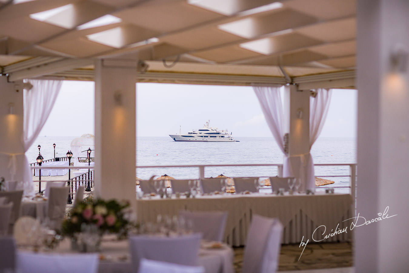 Wedding venue view over the sea during a Beautiful Wedding at Elias Beach Hotel captured by Cyprus Photographer Cristian Dascalu.