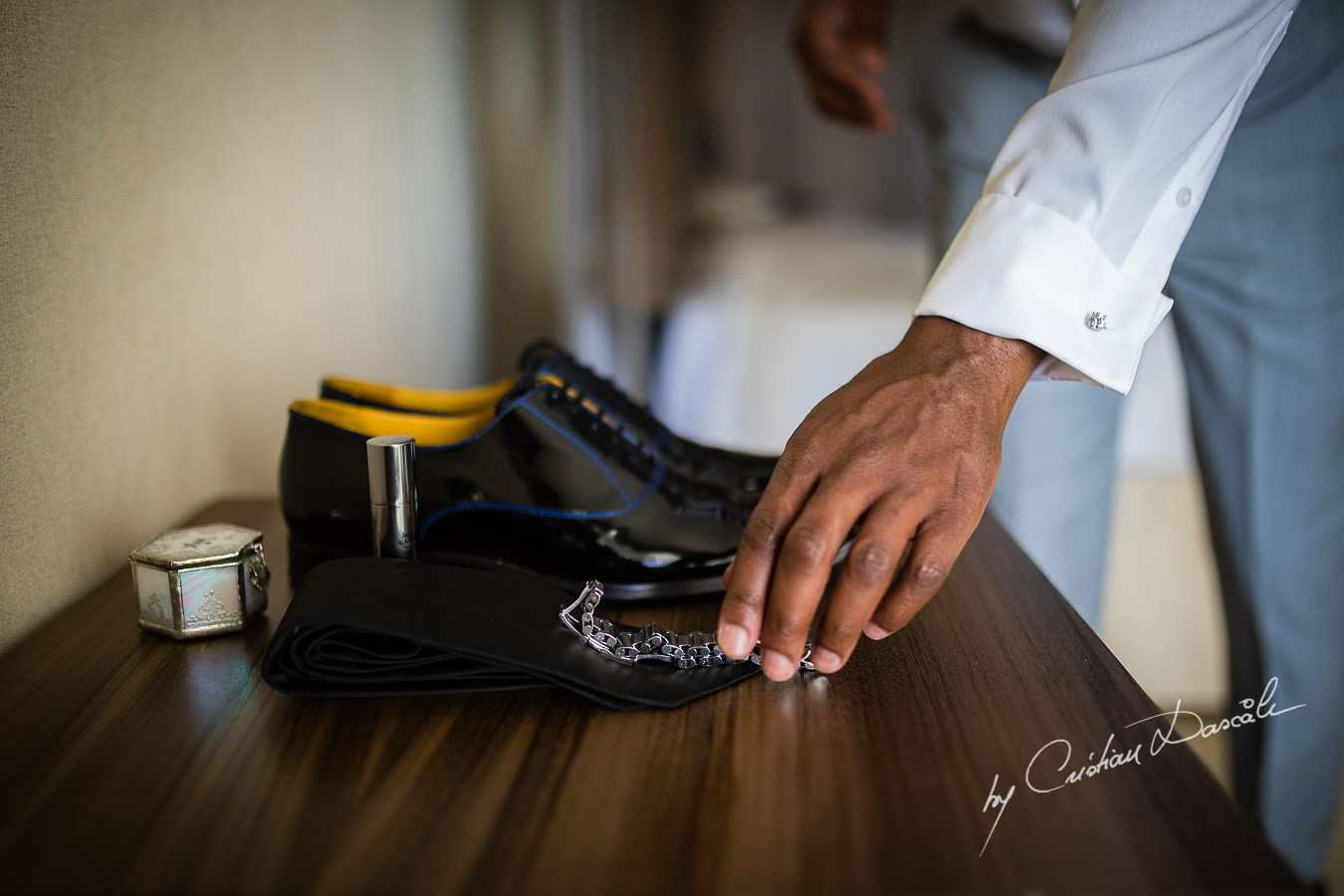 Moments with the groom captured during an Exquisite Wedding at Asterias Beach Hotel by Cyprus Photographer Cristian Dascalu.