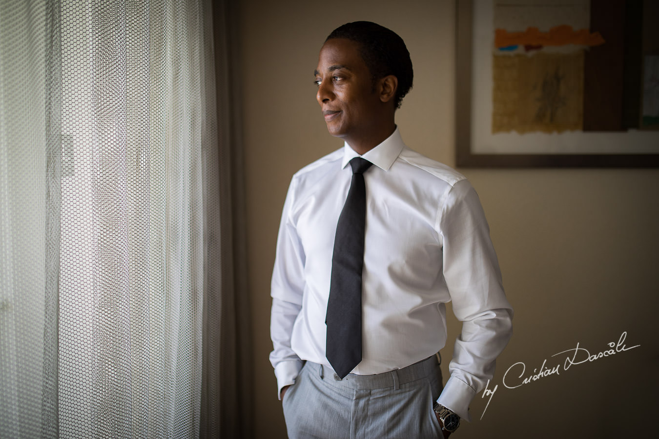 Groom portrait captured during an Exquisite Wedding at Asterias Beach Hotel by Cyprus Photographer Cristian Dascalu.