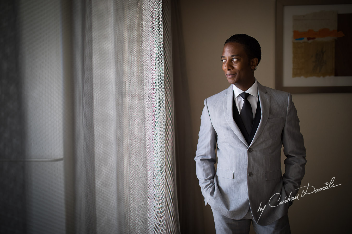 Groom portrait captured during an Exquisite Wedding at Asterias Beach Hotel by Cyprus Photographer Cristian Dascalu.