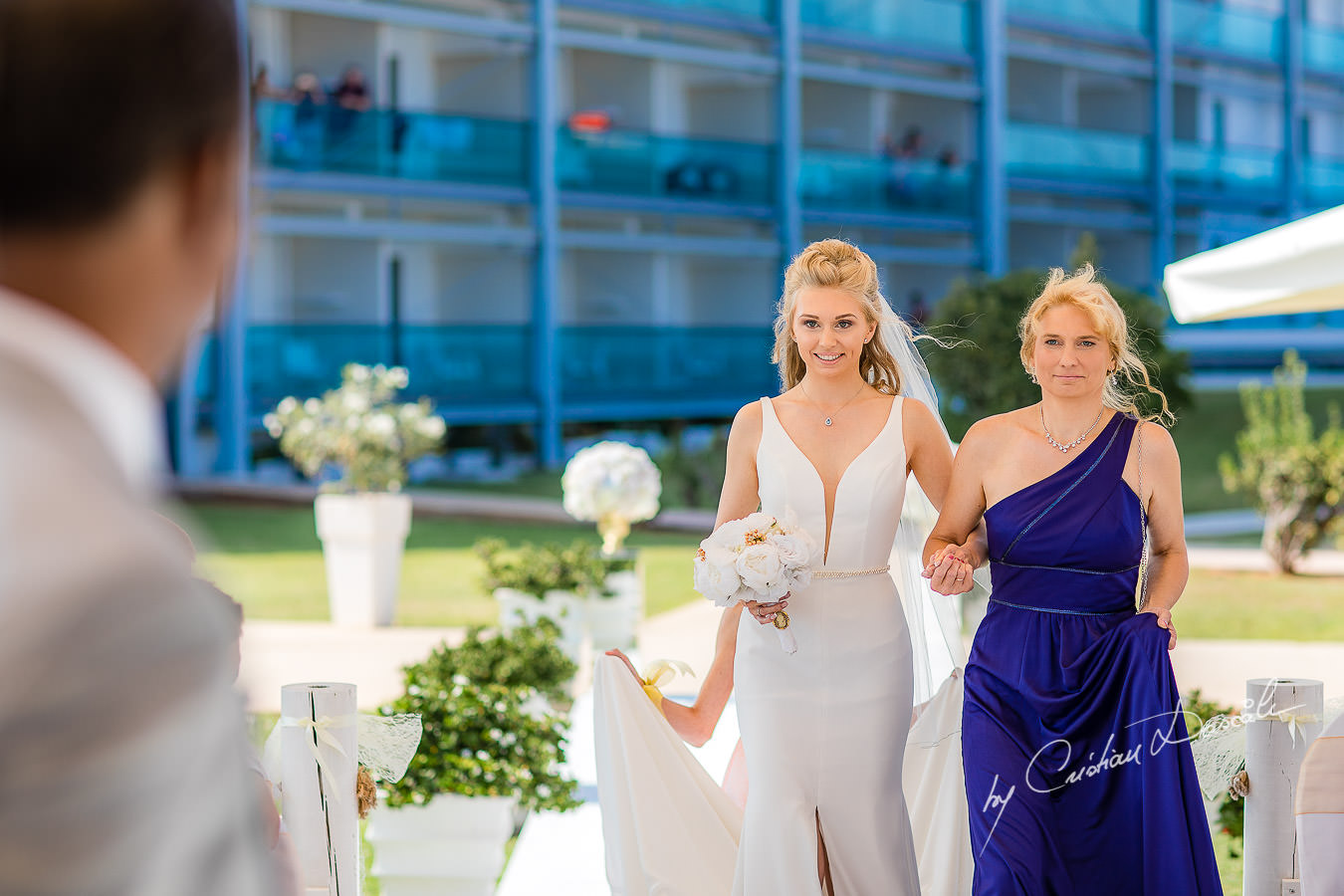 Bride arrival at an Exquisite Wedding at Asterias Beach Hotel. Photography by Cyprus Photographer Cristian Dascalu.